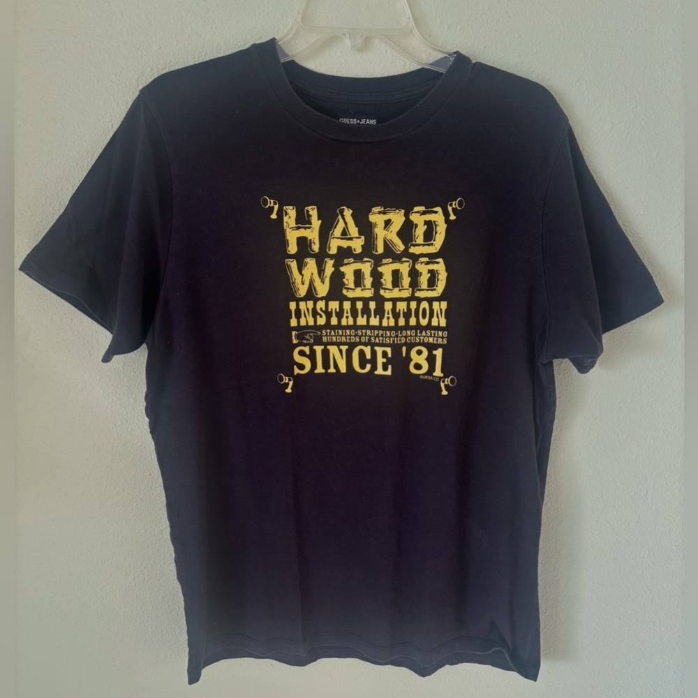 Vintage Guess Jeans “Hard Wood Installation,” Black & Yellow T Shirt Size: XL - Picture 1 of 5